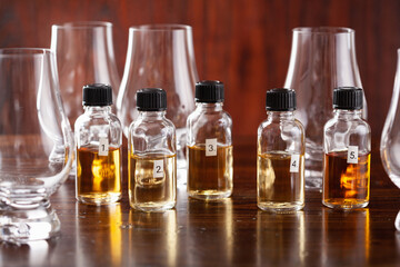 tasting bottles and glasses of whisky spirit brandy cognac. tasting at home