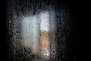 Water drops on the bathroom door glass