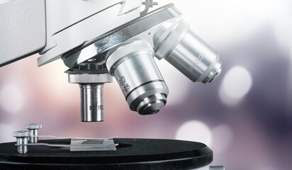 Scientific microscope with metal lens at the laboratory, Modern medical laboratory equipment