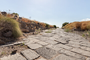 Cobbled  road to the ruins of the Greek - Roman city of the 3rd century BC - the 8th century AD Hippus - Susita on the Golan Heights near the Sea of Galilee - Kineret, Israel