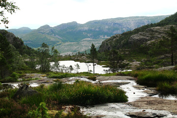 Fototapeta na wymiar Beautiful landscape with a stream and valley in Norway.