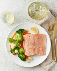 Steam salmon and vegetables, Paleo, keto, fodmap, dash diet. Mediterranean diet with steamed fish