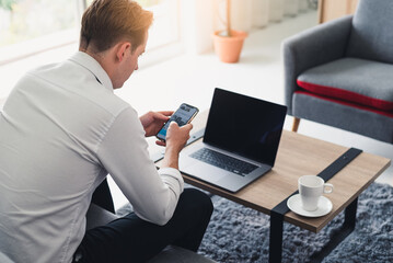 the abstract image of the man is quarantining himself and use video conference method at his home office. the concept of covid-19, work at home, quarantine, healthcare and business.