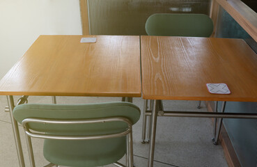 picture of table in restaurant that keep social distancing to prevent infection during covid-19 or coronavirus outbreak. new normal lifestyle concept