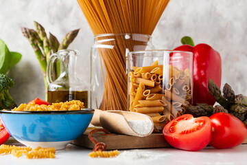 Whole grain pasta and organic vegetables, cooking concept