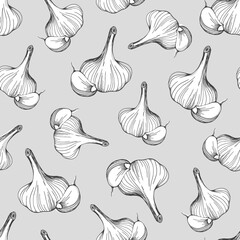  seamless pattern of garlic on a grey background.A simple pattern of garlic.Hand-drawn vector illustration in the Doodle style.Head of garlic