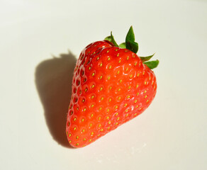 a strawberry on a white background