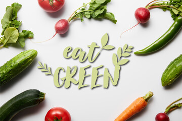 top view of raw tasty vegetables with green leaves on white background with eat green illustration