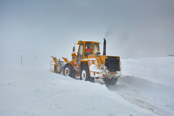 Snowblower at work in the mountains
