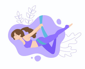 Aero yoga, fly yoga, inverted yoga pose in hammocks, Aerial Yoga. happy young girl hanging in a hammock in the pose of a flying pigeon