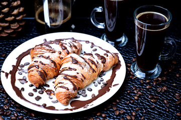 Chocolate croissants and fresh coffee for a fresh morning start