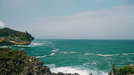 Beautiful beach with stunning views of rocks, nature and whites sand