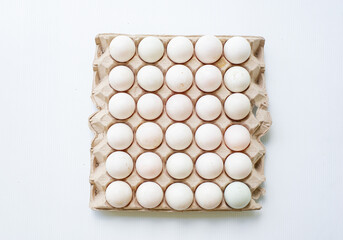 The paper tray is made from recycled paper packed with eggs.