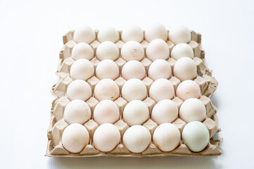 The paper tray is made from recycled paper packed with eggs.