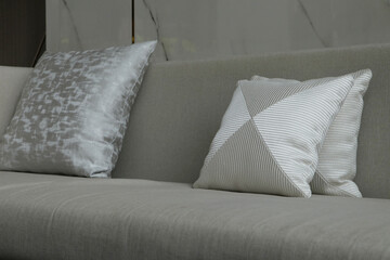Close up detail of grey fabric sofa in living room