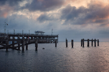 Morning view of a sea pier in the south of England on the shore of a sea bay. Swanage Bay, United Kingdom