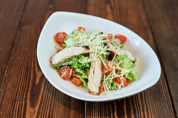 A plate of food sitting on top of a wooden table