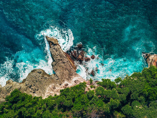 Aerial or Drone photo of a beautiful cliff above the Ocean on an Island off of Bali, Indonesia