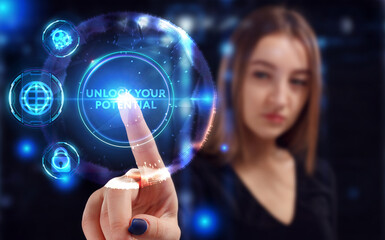 Business, Technology, Internet and network concept. Young businessman working on a virtual screen of the future and sees the inscription: Unlock your potential