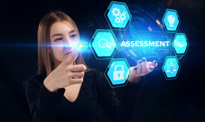 Business, Technology, Internet and network concept. Young businessman working on a virtual screen of the future and sees the inscription: Assessment