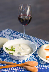 Georgian traditional food Gebjalia, cheese in milk and greens, species.
