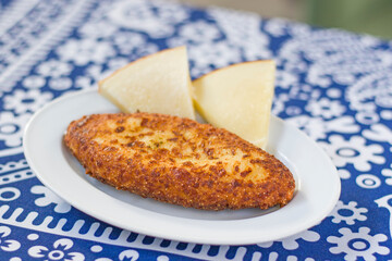 Georgian traditional food Chvishtari, corn meal with cheese and corn. Baked and ready to eat.