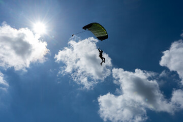 silhouette of a parachutist