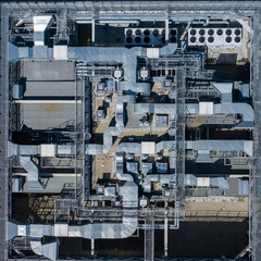 Air Condition Ventilation System on the Building Roof. Industrial Air system of ventilation and Air conditioning. Aerial Shot.