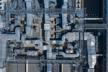 Air Condition Ventilation System on the Building Roof. Industrial Air system of ventilation and Air conditioning. Aerial Shot.