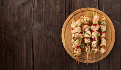 Banner healthy barbecue. Chicken kebab with vegetables and herbs, juicy tasty snack for a summer picnic, top view