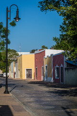 Typical street with beautiful pastel-painted houses, Valladolid, Yucatan, Mexico