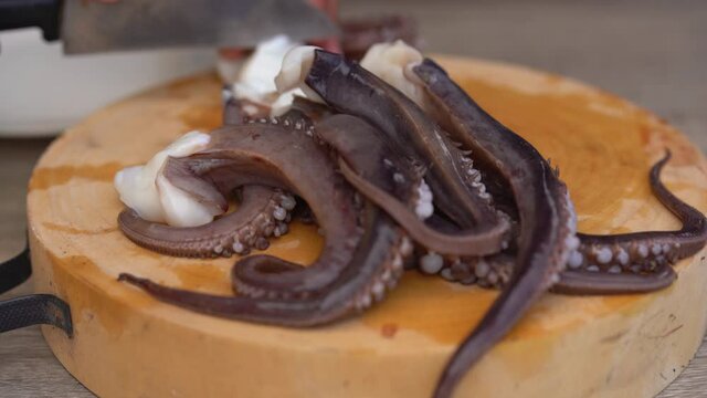 
Sliced squid on butcher for cooking seafood