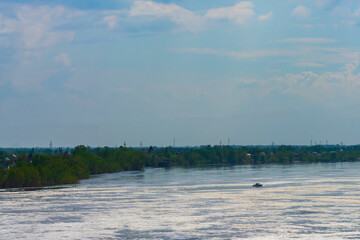 The Volga River near the Volgograd hydroelectric station. In the distance is a shore with large...