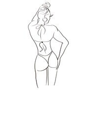 A young sexy girl in bikini is standing with her hand on her hip.