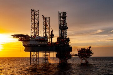 oil rig at sunset