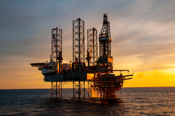 oil rig at sunset