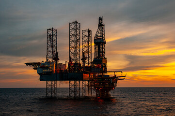 oil rig at sunset