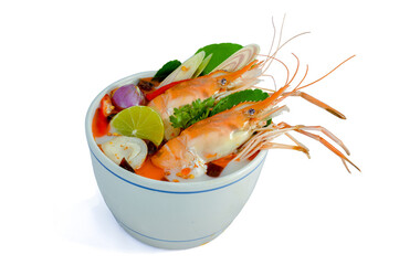 Prawn spicy soup bowl with spices ingredients on dark background / Cooked seafood with shrimp soup dinner table thai food asian traditional , Tom Yum Kung