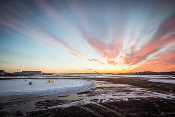 Fototapeta na wymiar winter sunset on airport tarmac