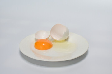 broken egg on a white background