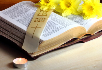 Catholic blessing for Easter celebrations showing service with holy bible and bookmark with daffodils