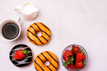 Chocolate and Orange Donuts with Fresh Strawberries and Cup of Coffee Cream Top View Flat Lay Copy Space Breakfast Concept Morning