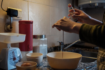 woman pouring milk into glass