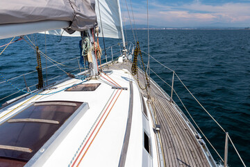 sea view from the deck of a white sailing yacht