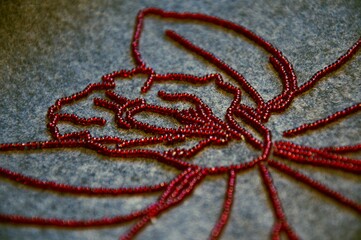 close up of a red beads