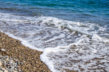 Seascape background colorful sea waves on coast