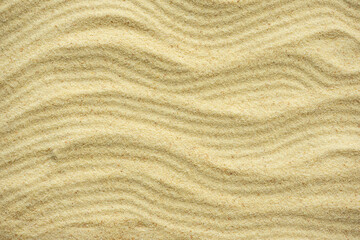 Empty sand on the beach. Summer background. Top view