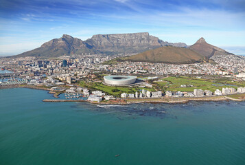 Obraz premium Cape Town, Western Cape / South Africa - 06/24/2019 - Aerial photo of Cape Town Harbour Container Terminal, CBD and Table Mountain