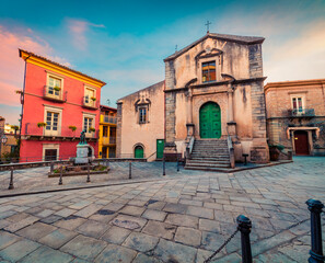 Amazing cityscape of Novara di Sicilia town with Chiesa di San Nicolo church. Colorful spring...