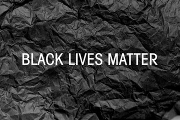 Black lives matter on a Crumpled Black Paper
